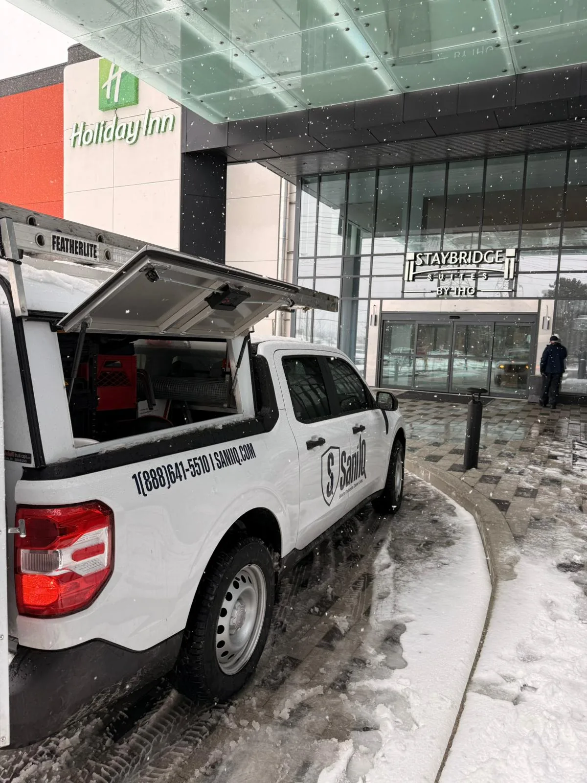Sani IQ technician on a commercial pest control inspection at a hotel property