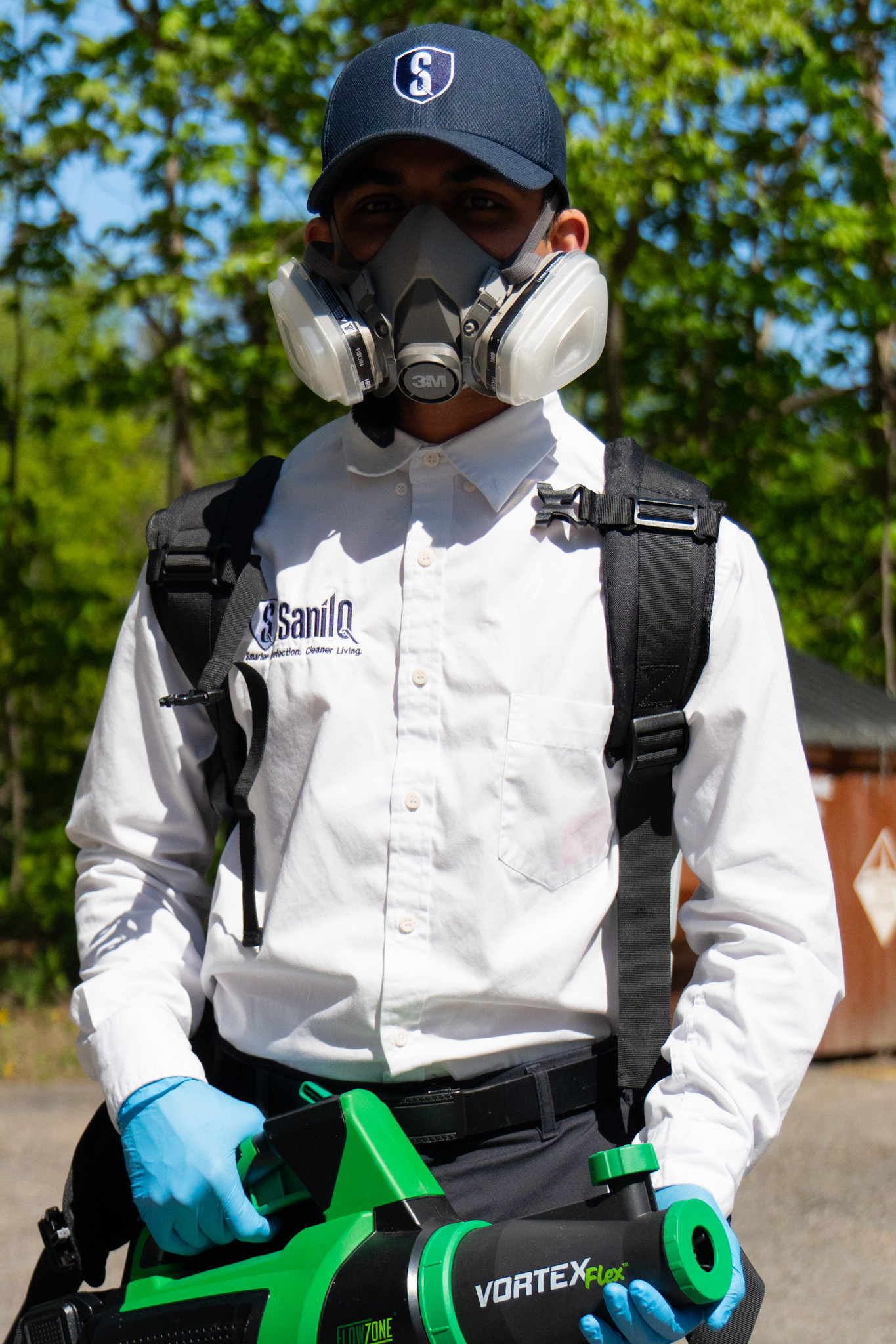 Sani IQ technician inspecting home for pests